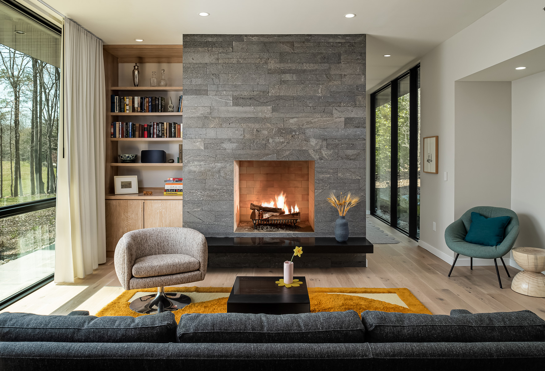modern living room with fireplace skillfully photographed by Asheville photographer