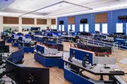 a room full of computers and monitors.