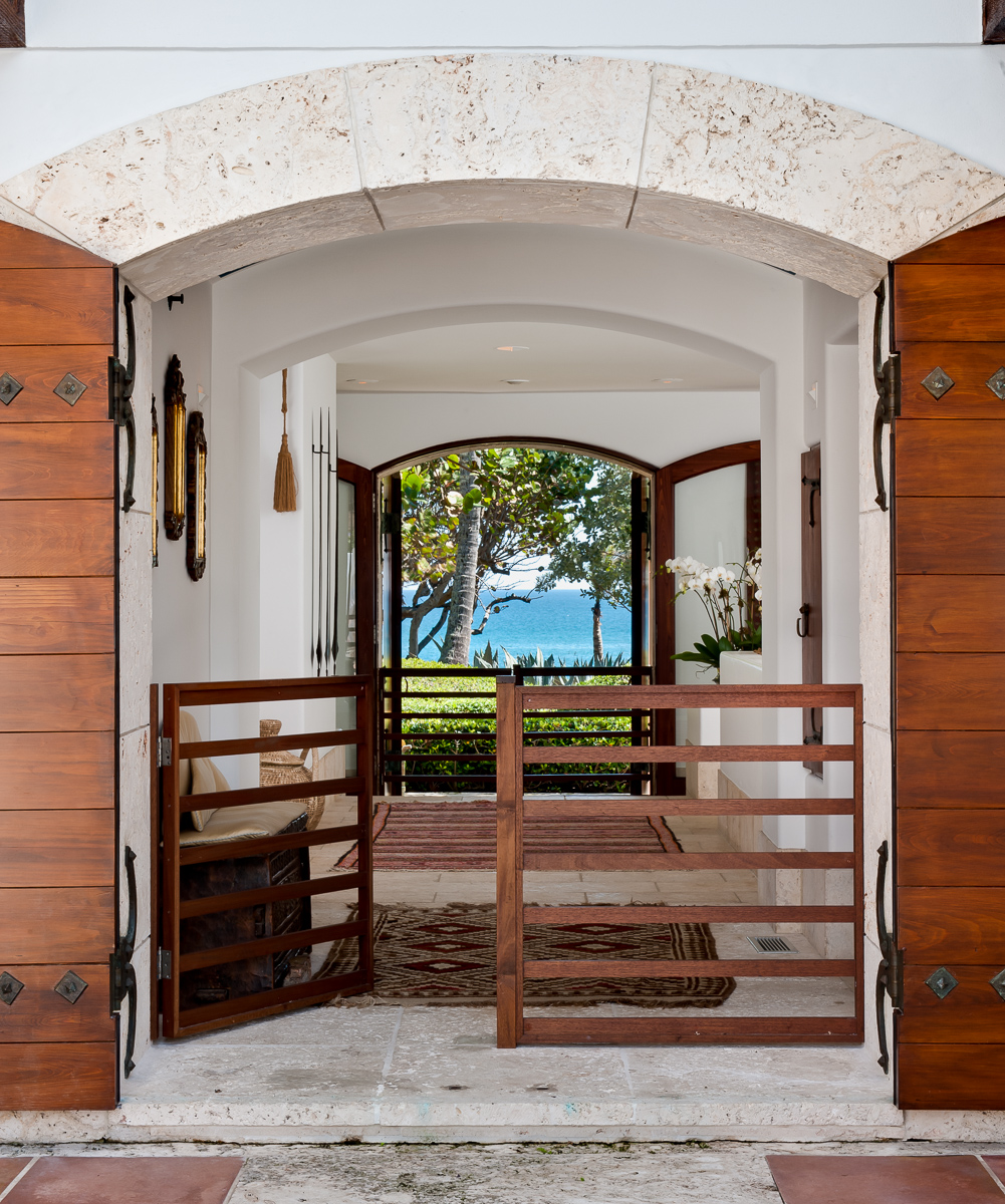 Looking though an open air entryway toward the Atlantic Ocean professionally captured by Andy Frame