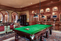 a pool table in a room.